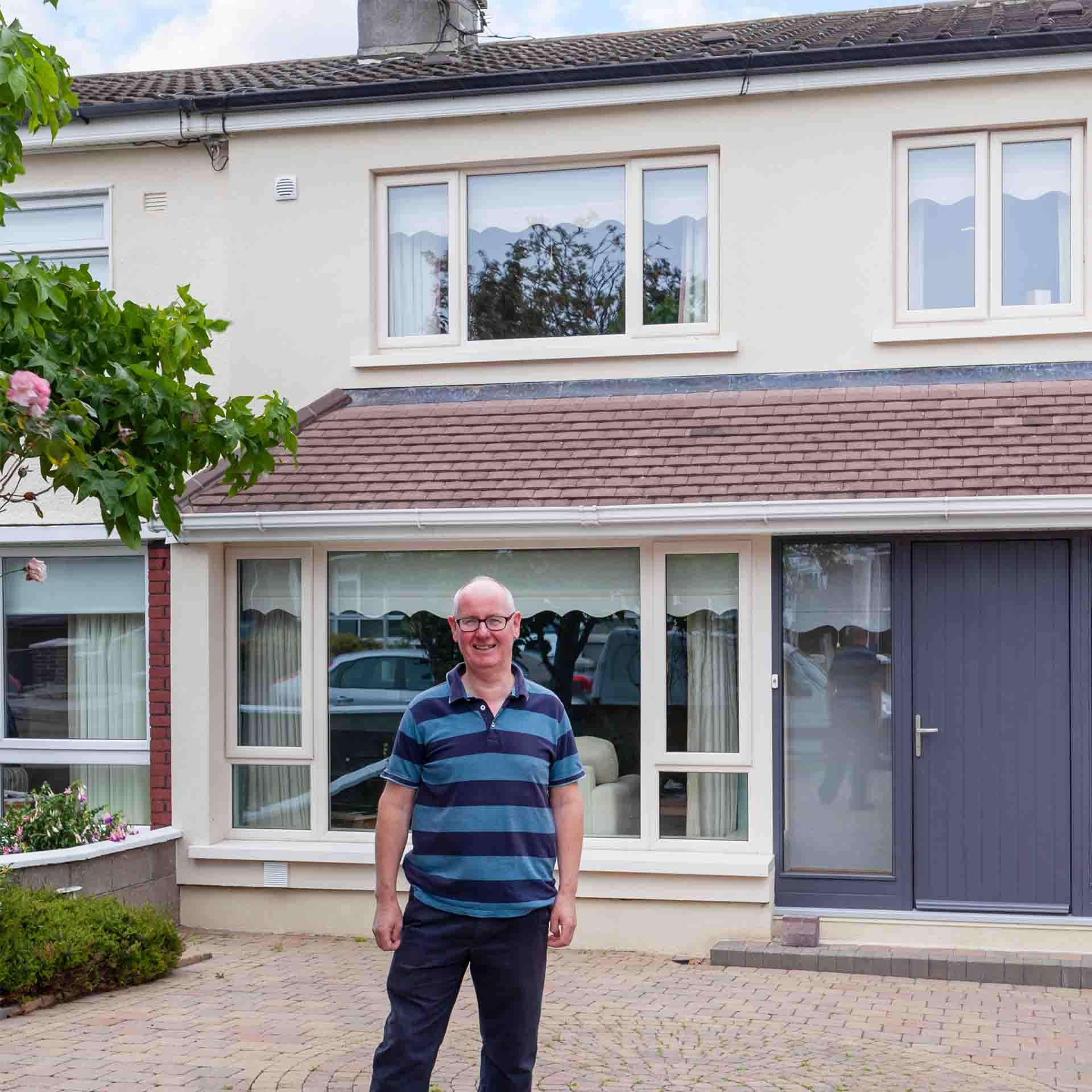 Man standing outside his Deep Retrofitted home in Dublin