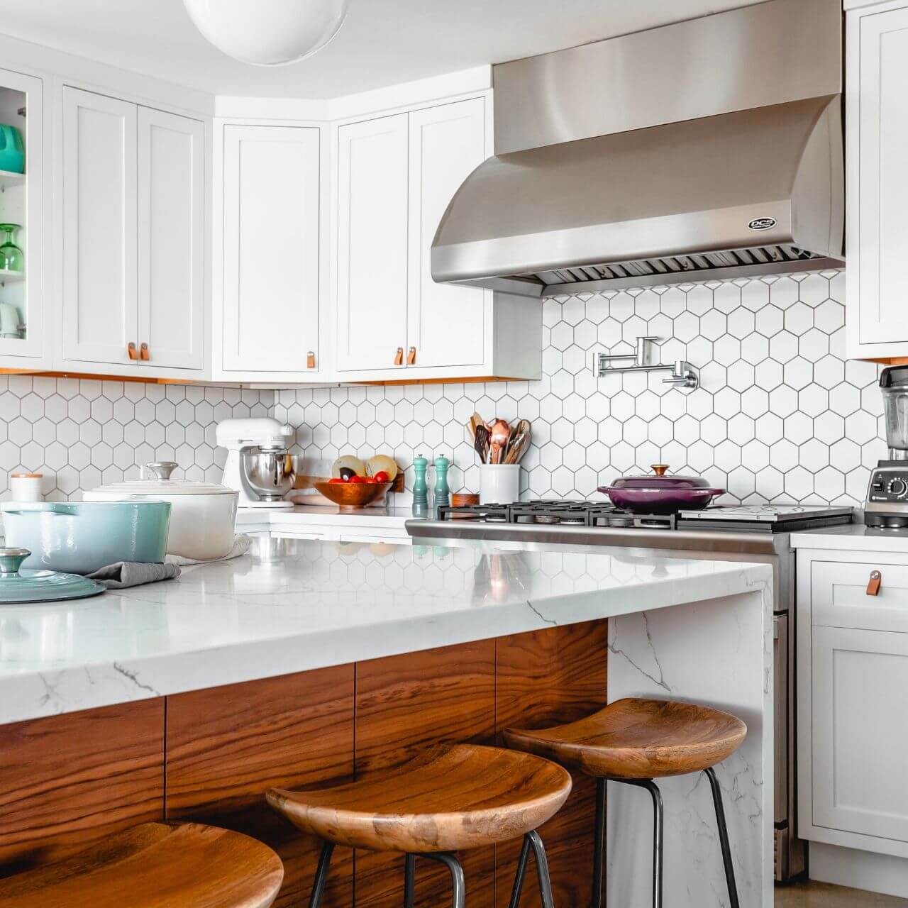 Bright modern kitchen with white tiles